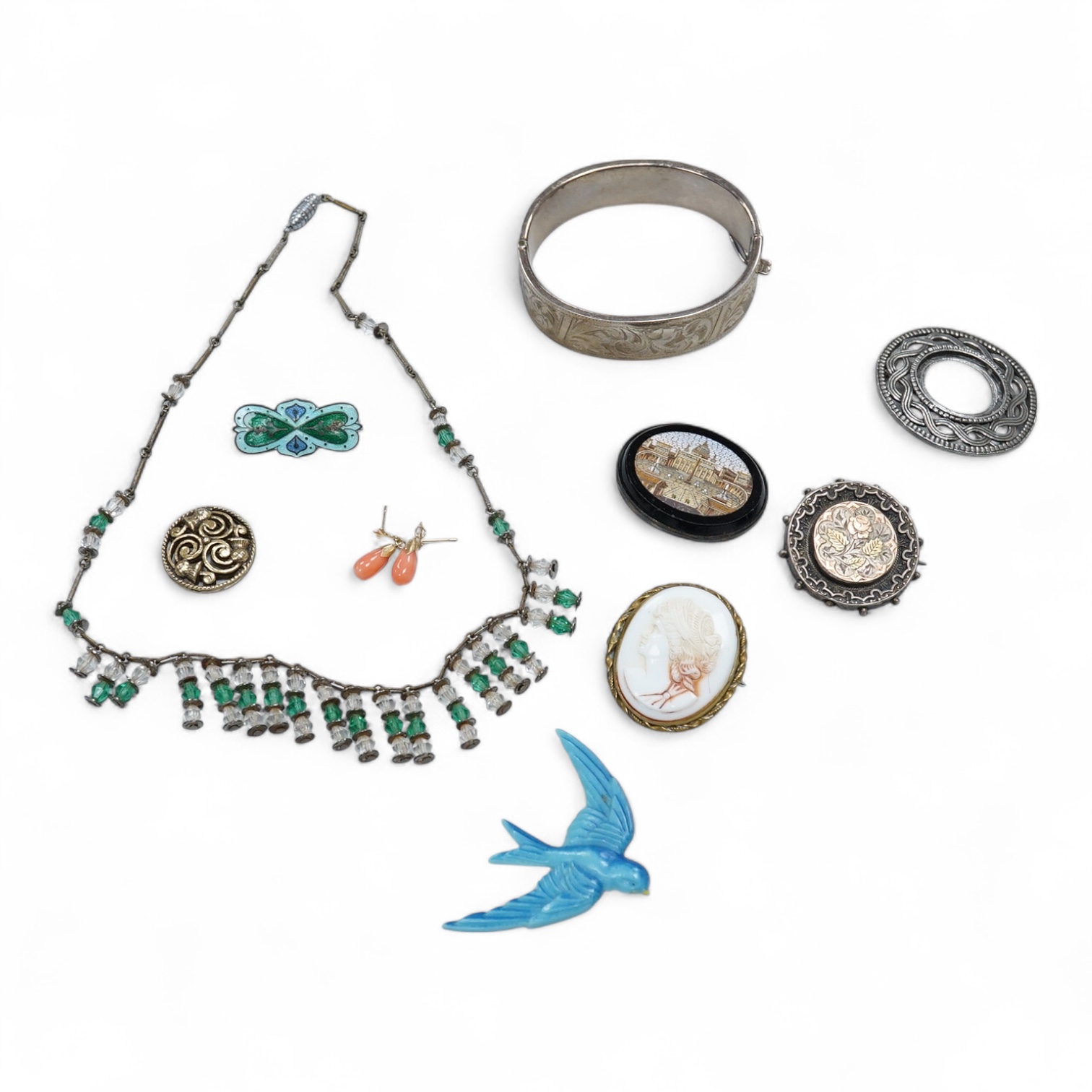 A group of mainly antique jewellery including micro-mosaic plaque, a pair of 9ct and coral drop earrings, a silver bangle, a George V enamel and silver brooch(a.f.) etc.